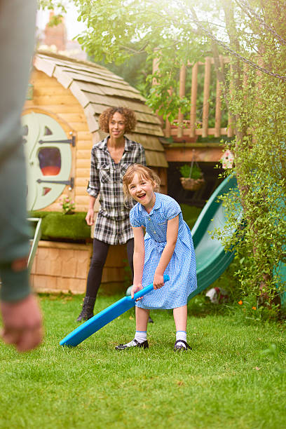 istock cricket girl ready for the bowl 541155746