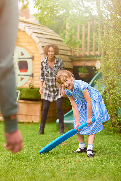 istock cheeky  girl ready to bat 541156090