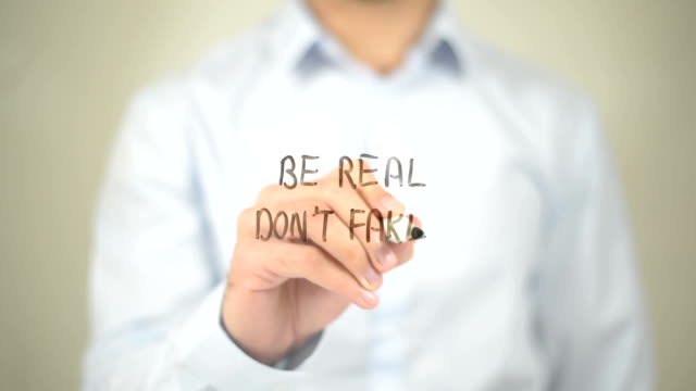 Be Real Don't Fake, Man writing on transparent screen