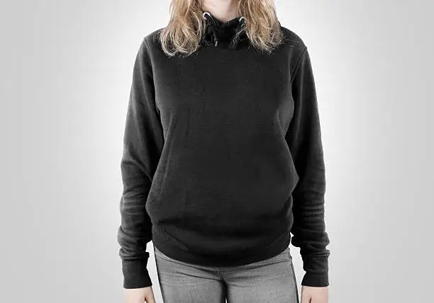 Photo of Blank black sweatshirt mock up isolated. Female wear dark hoodie