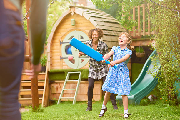 istock playing cricket in the garden 541265938