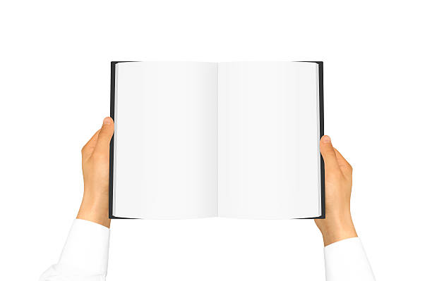 istock Hand in white shirt sleeve holding blank book 541267226