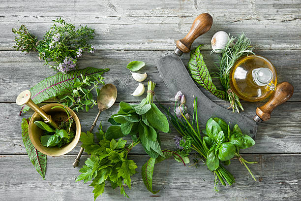 istock fresh herbs and spices on wooden table 541267690
