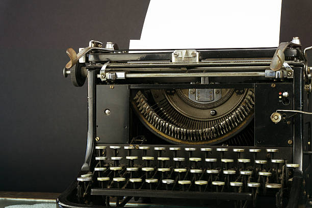 istock Old and Dusty Typewriter with a sheet of paper 541267914