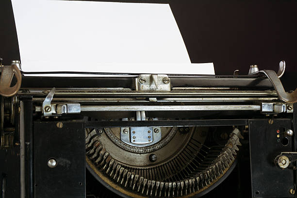 istock Old and Dusty Typewriter with a sheet of paper 541268216