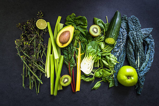 istock vegetables and fruits for green smoothie, flat lay 541270574