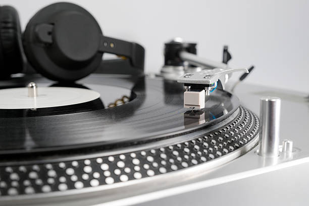 istock Vinyl record and headphones on the player 541271106
