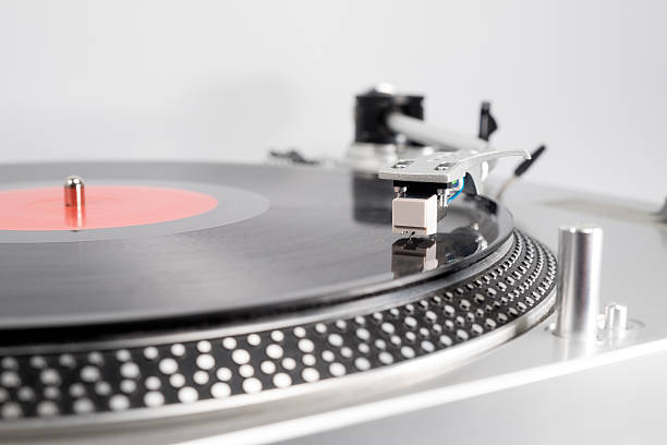 istock Red vinyl record on the player 541271130