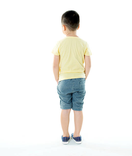 china little boy - isolated on white full length lifestyles yellow fotografías e imágenes de stock