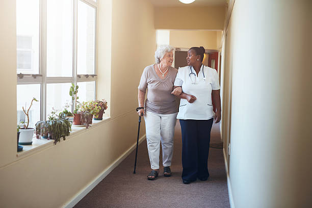 istock Healthcare work helping female patient. 541272670