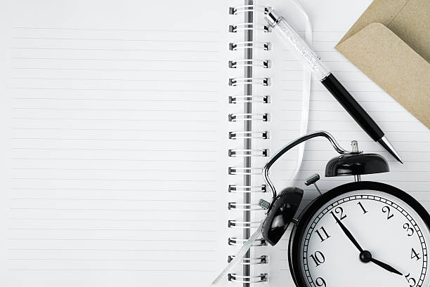 istock Free copy space of notebook with pen, clock and envelope. 541274052