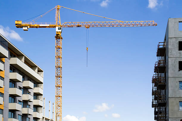 istock Construction site with cranes against blue sky. New high-rise 541275654