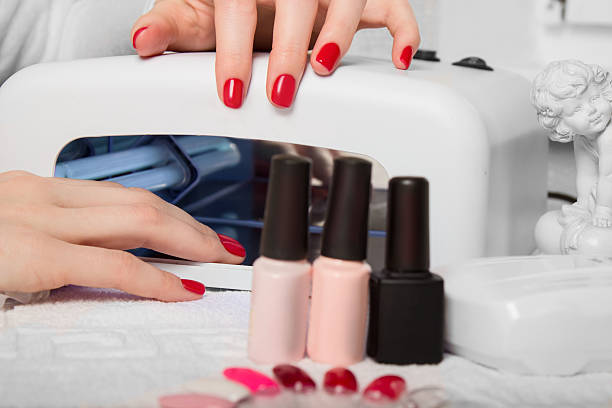 istock Manicure - Beautiful manicured woman's nails with red nail polish 541275722