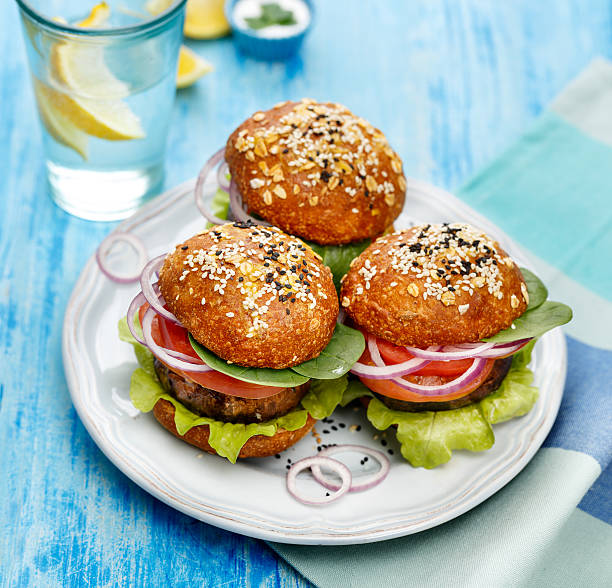 Baked portobello mushroom burger with addition fresh vegetables