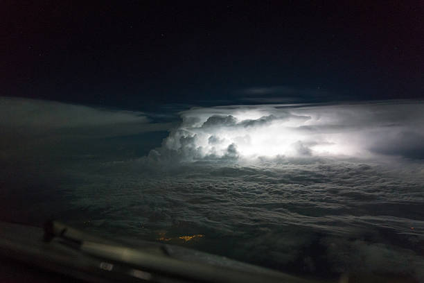 Thunderstorms over Colombia sea with big vertical development and lightning bolts.
