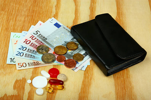 istock Pills, euro money and wallet 541282468