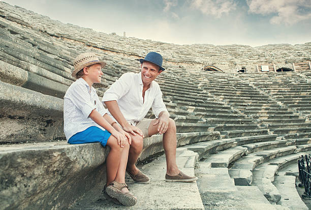 istock Father and son spent time together on antique ruins 541283774