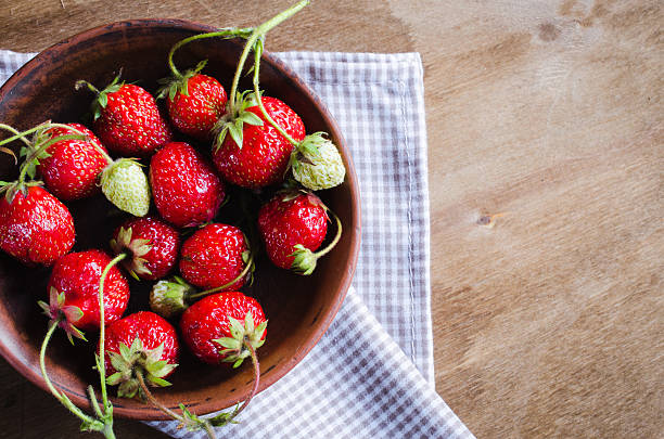 istock Fresh ripe organic strawberry on wooden background. Rustic style. 541284986