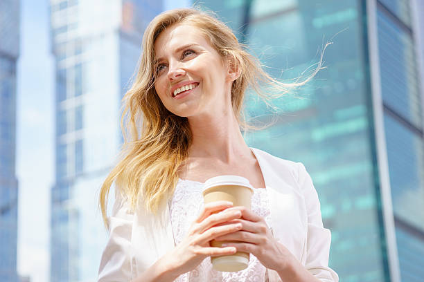 istock Beautiful Woman with Coffee to 541285818
