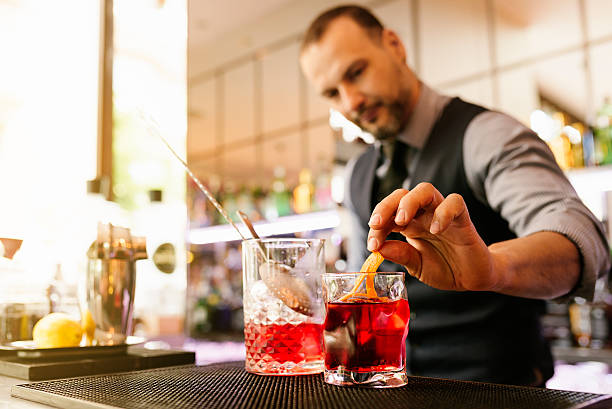 istock Barman is making cocktail at night club. 541287468