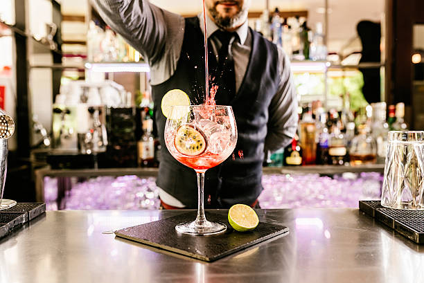 istock Barman is making cocktail at night club. 541287968