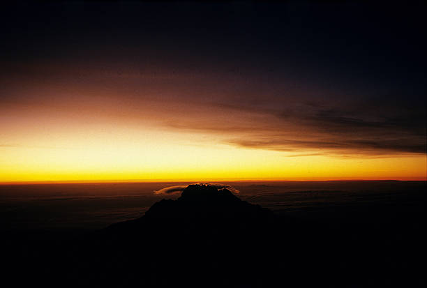 Mawenzi peak at dawn, viewed from Gillman's Point Climbing Mt. Kilimanjaro, Mawenzi peak at dawn, viewed from Gillman's Point mawenzi stock pictures, royalty-free photos & images