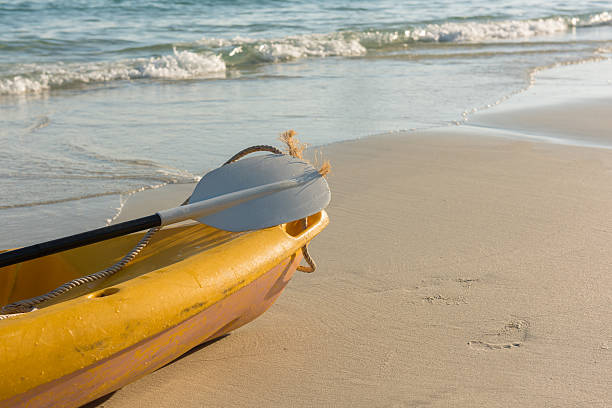 istock The empty yellow kayak on the beach. 541293358