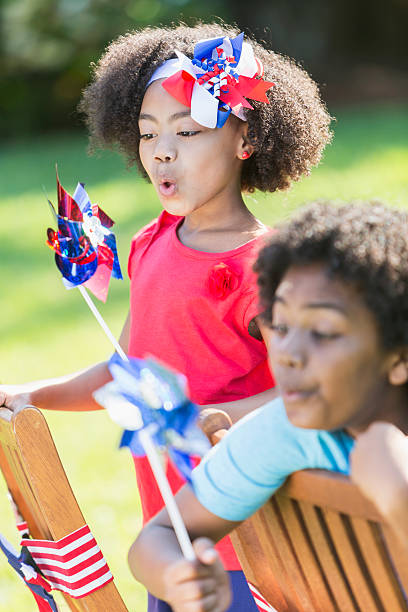 istock Mixed race children celebrating American patriotic event 541294076