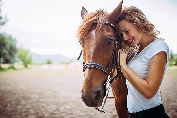 istock Lady and horse 541295778