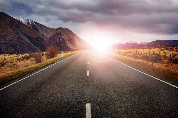 istock beautiful sun rising sky with asphalt highways road 541296348