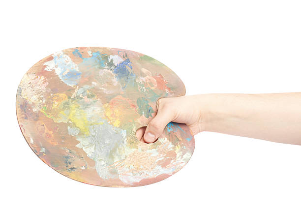 istock Hand holding a wooden palette isolated 541296782