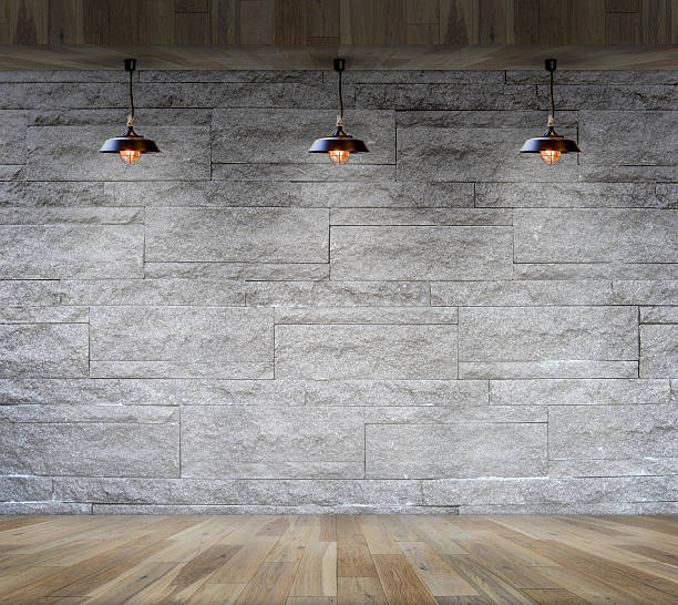istock interior granite stone decorative brick wall with lamp interior 541298380