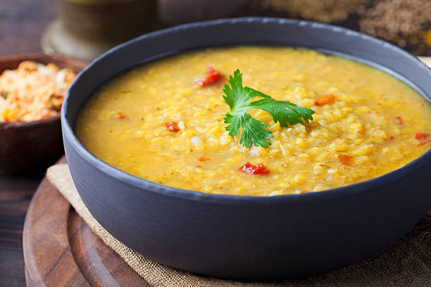 istock Red lentil Indian soup with flat bread Masoor dal 541300860