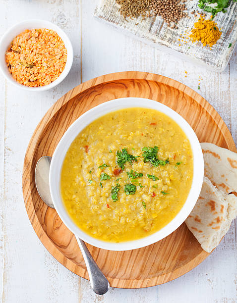 istock Lentil soup with bread in a ceramic white bowl 541300912
