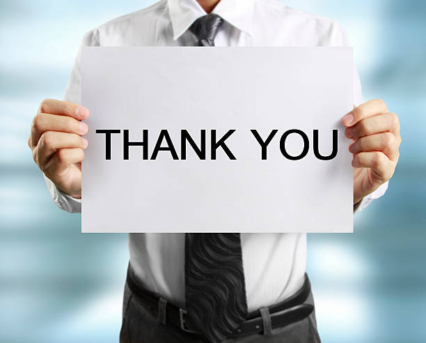 istock blank sheet of paper in  hand 541302196