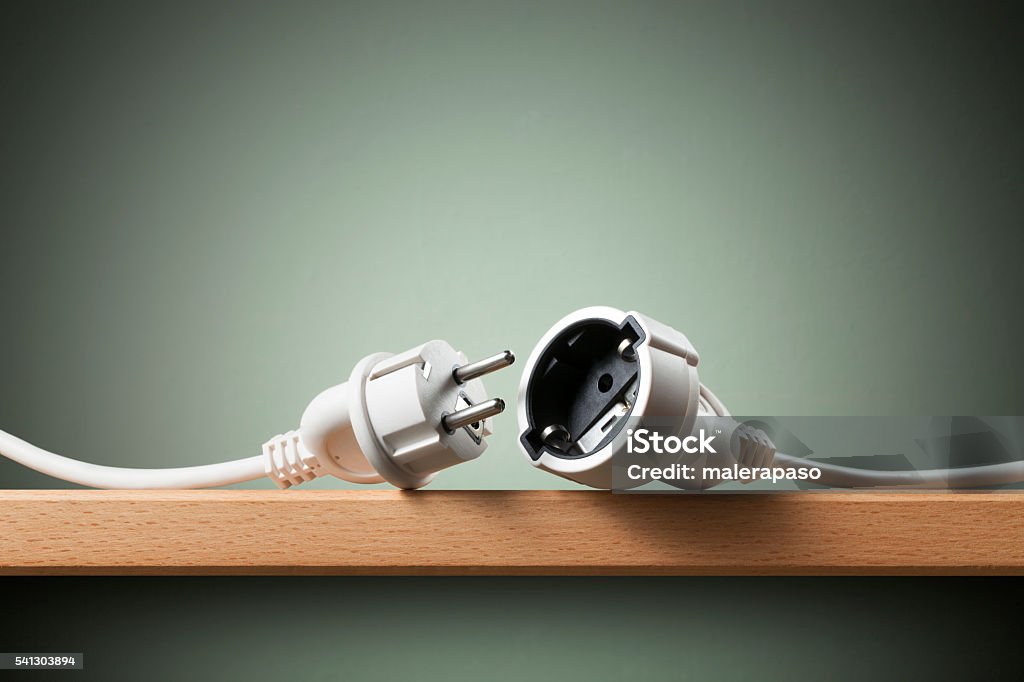 Electric power cable with plug and socket unplugged Electric power cable with plug and socket unplugged. Electric Plug Stock Photo