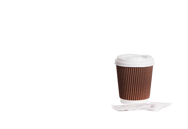 istock Disposable cup of coffee in hand 541303970