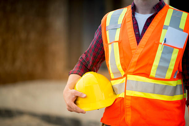 istock Holding a Safety Helmet 541310642