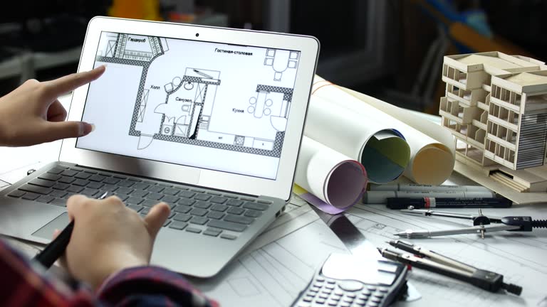 Female Architect working with Laptop at home office architecture, Architect concept