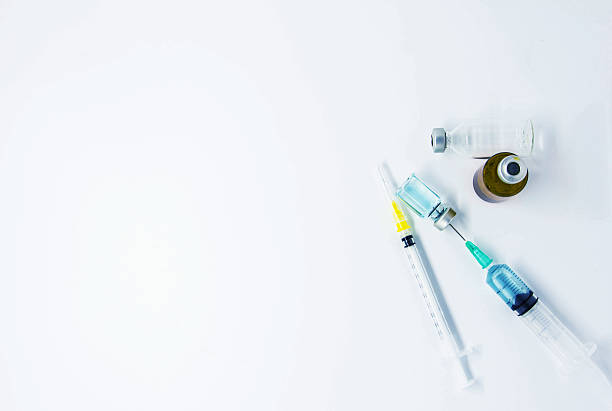 istock medical ampules,pills and syringes 541565402