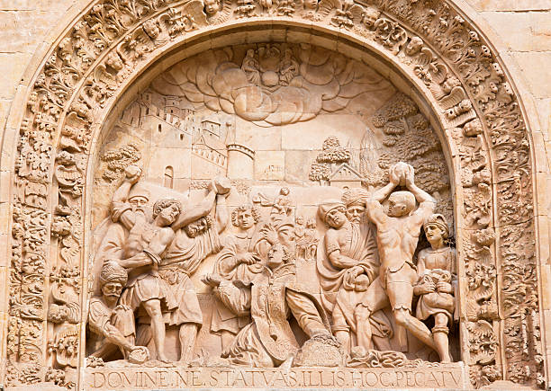 Salamanca - The Lapidate of st. Stephen relief Salamanca - The Lapidate of st. Stephen as the detail from portal of Convento de San Esteban by Juan Ribero de Rada (1590 - 1592) inspirated by Italian renaissance. martyr stock pictures, royalty-free photos & images