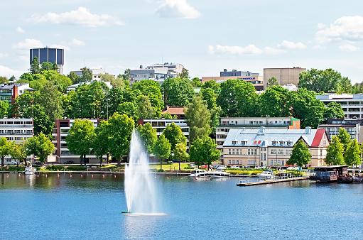 Lappeenranta, Finland - June 15, 2016:  Summer landscape with fountain and boats in Lappeenranta Harbor on Saima Lake. View from Linnoitus Fortress