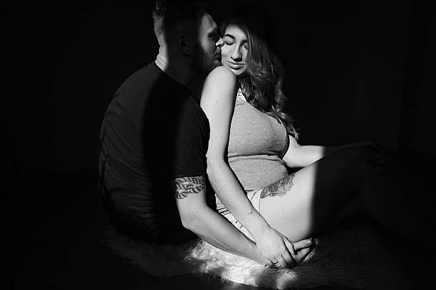 istock husband and pregnant wife 541570736