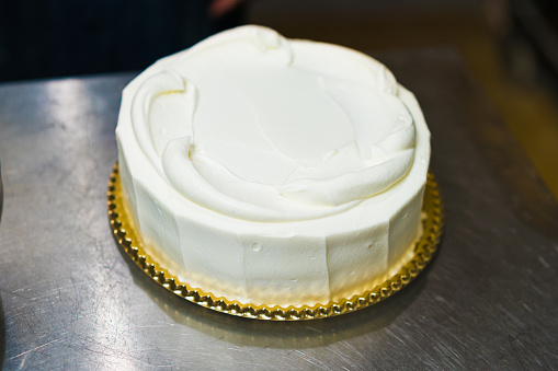 Unfinished strawberry shortcake seen in a bakery in Kyoto, Japan