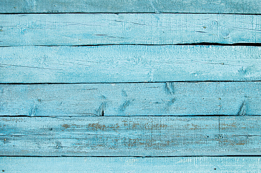 Vintage blue wooden background. Old weathered aquamarine board. Texture. Pattern. Wood background.