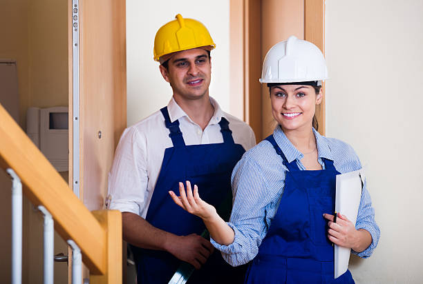 istock Professional maintenance crew of two specialists indoors 541574112
