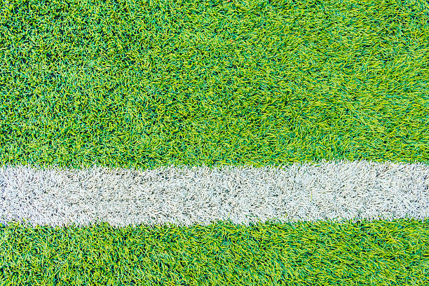 istock The football field line with artificial grass 541574662