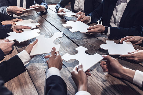 istock Business people and puzzle 541574770