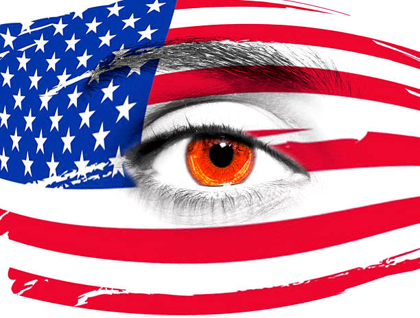 istock USA flag painted on woman face 541576170