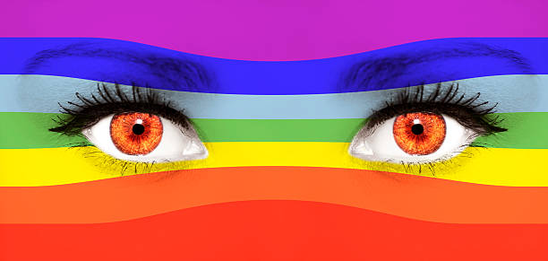 istock Close up of eyes. Painted face with rainbow flag 541576198